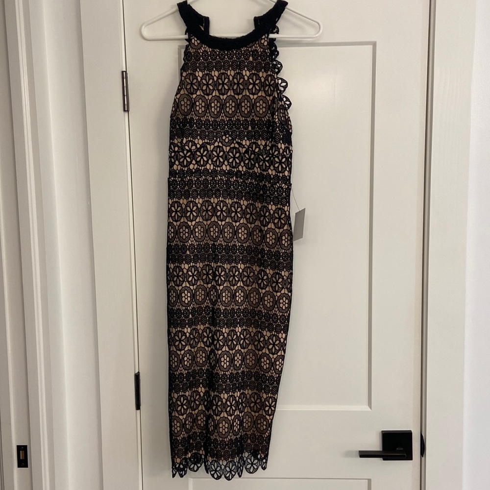 Lulus Black lace mid dress. Never worn still have tags